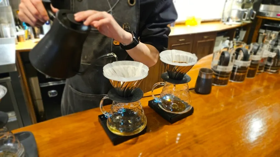 Drip coffee cup with a bean description card