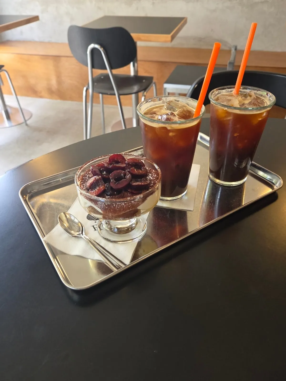 Ordered Americanos and cherry tiramisu