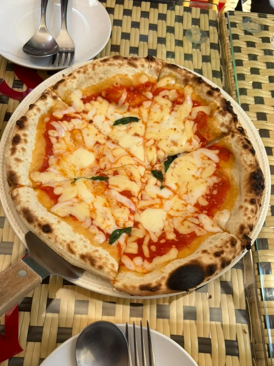 Margherita pizza topped with plenty of cheese