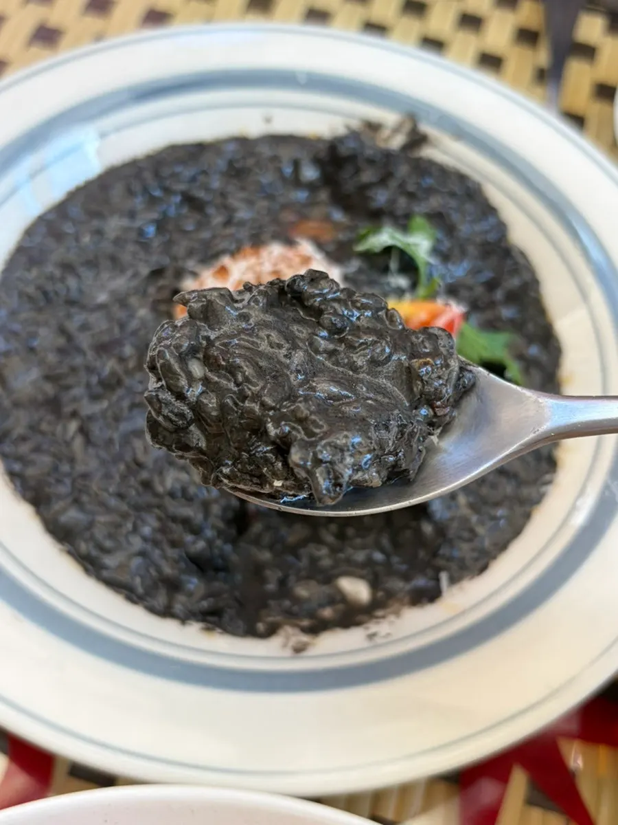A spoonful of squid ink risotto