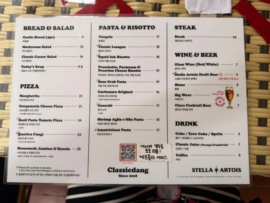 Classicdang menu board listing pasta, risotto, and pizza