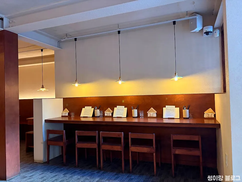 Interior of Jongno Donburi Yeonnam with wood-toned lighting