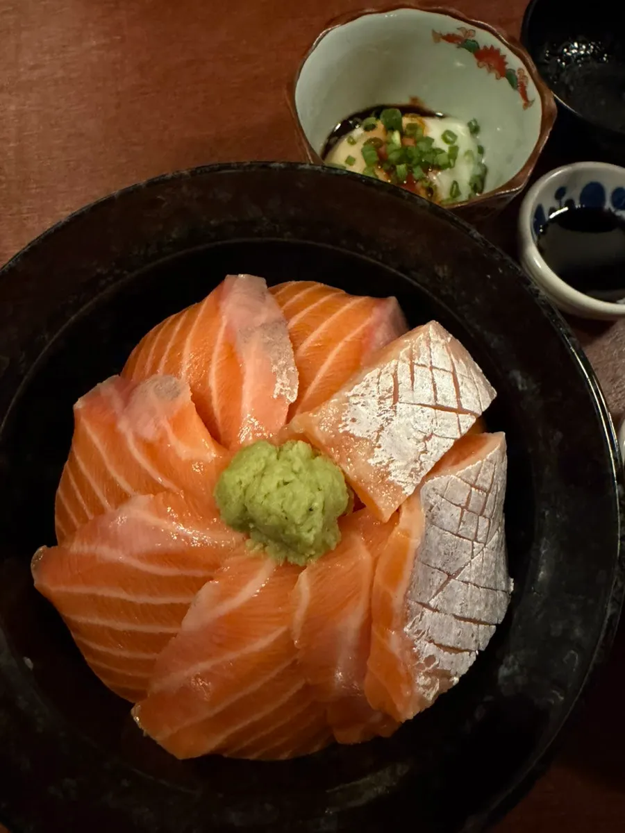 Close-up of the thick salmon belly rice bowl