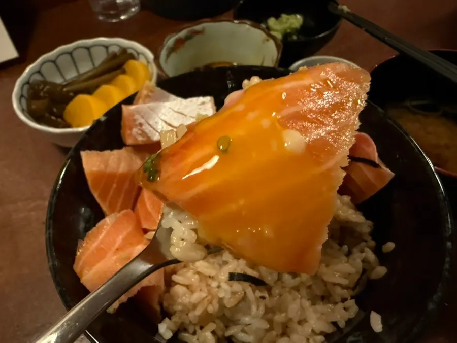 Onsen tamago with the yolk broken, mixed into the rice bowl