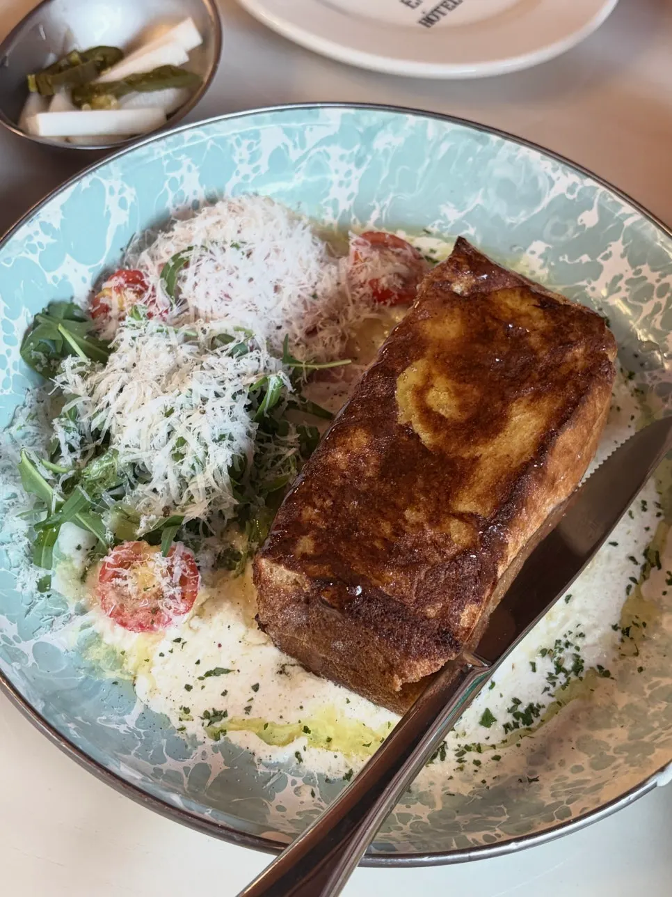 A plate of honey jambon French toast
