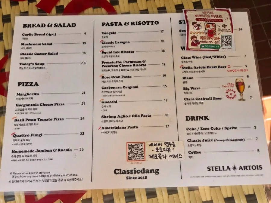 Classicdang's menu board listing pasta, pizza, and salad