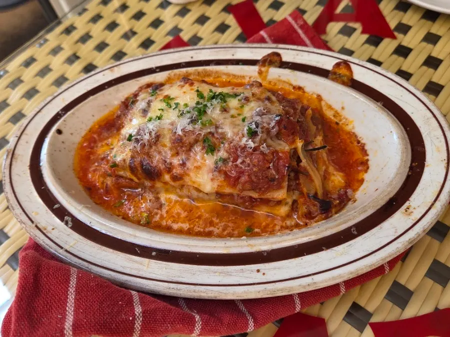 Lasagna piled high with sauce and cheese