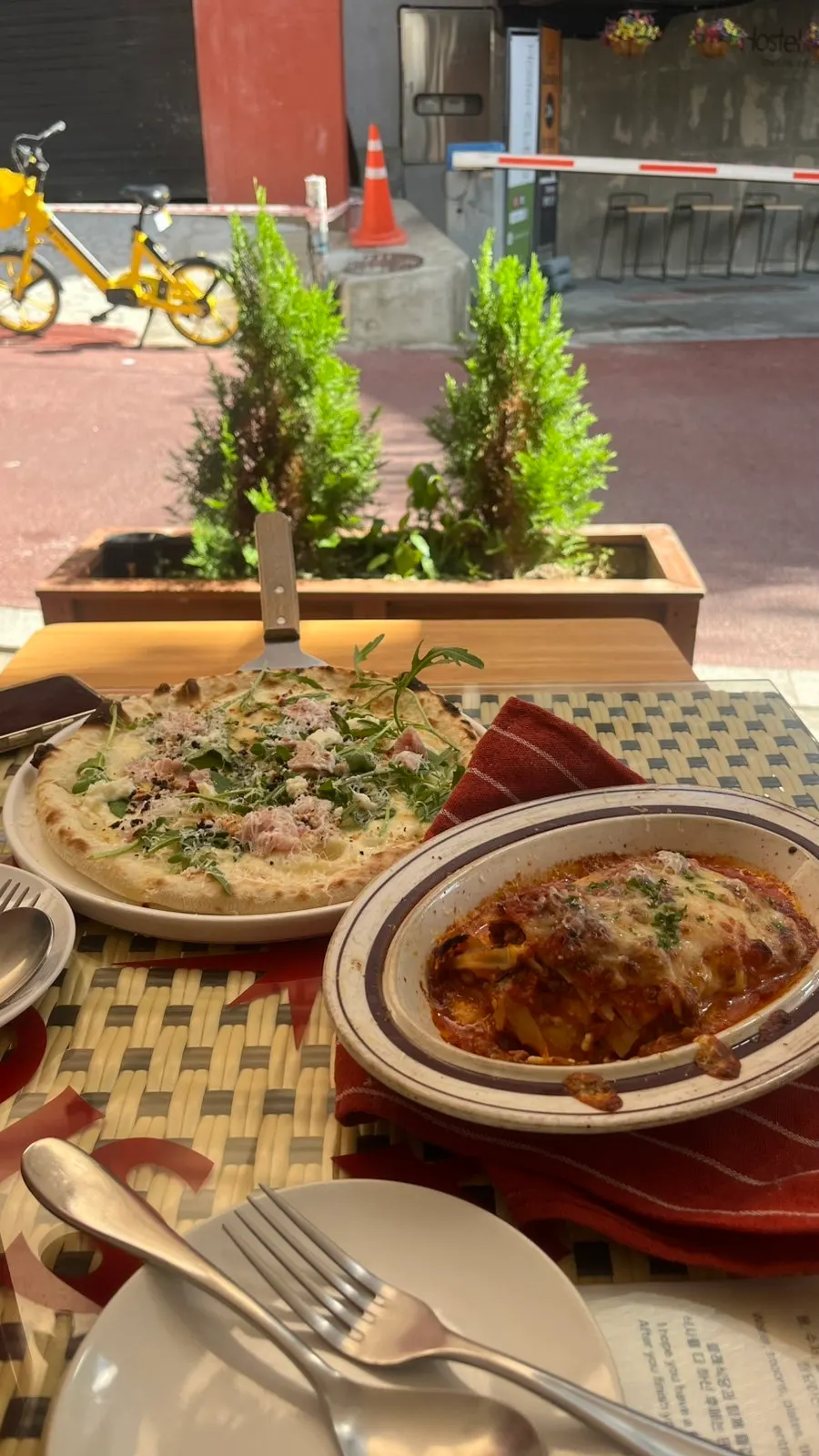 Dining scene at the sunlit outdoor seating