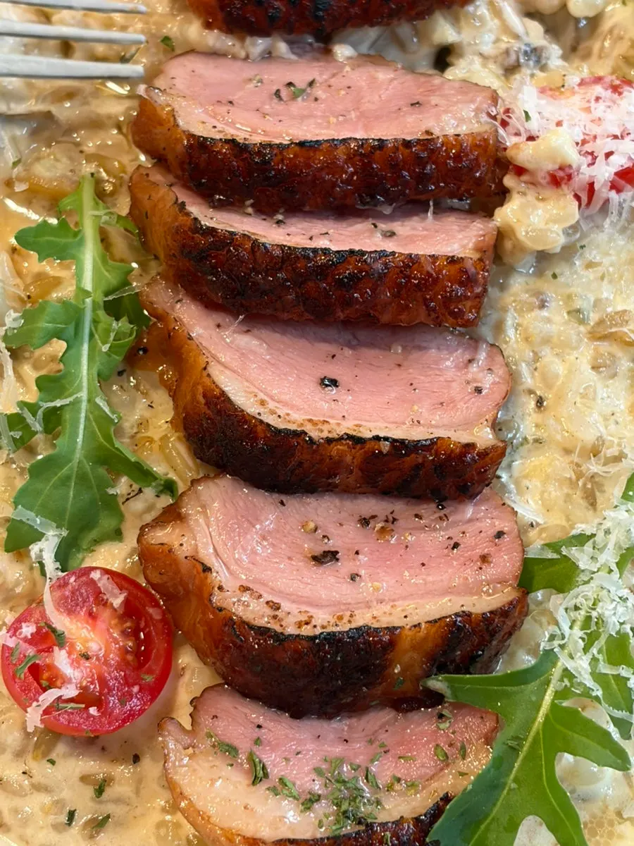 Duck steak paired with cream risotto