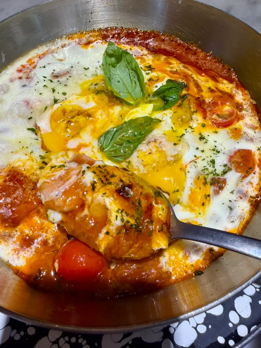 White bread served with egg in hell