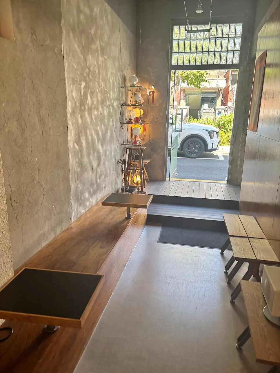 Café interior seating with various table shapes