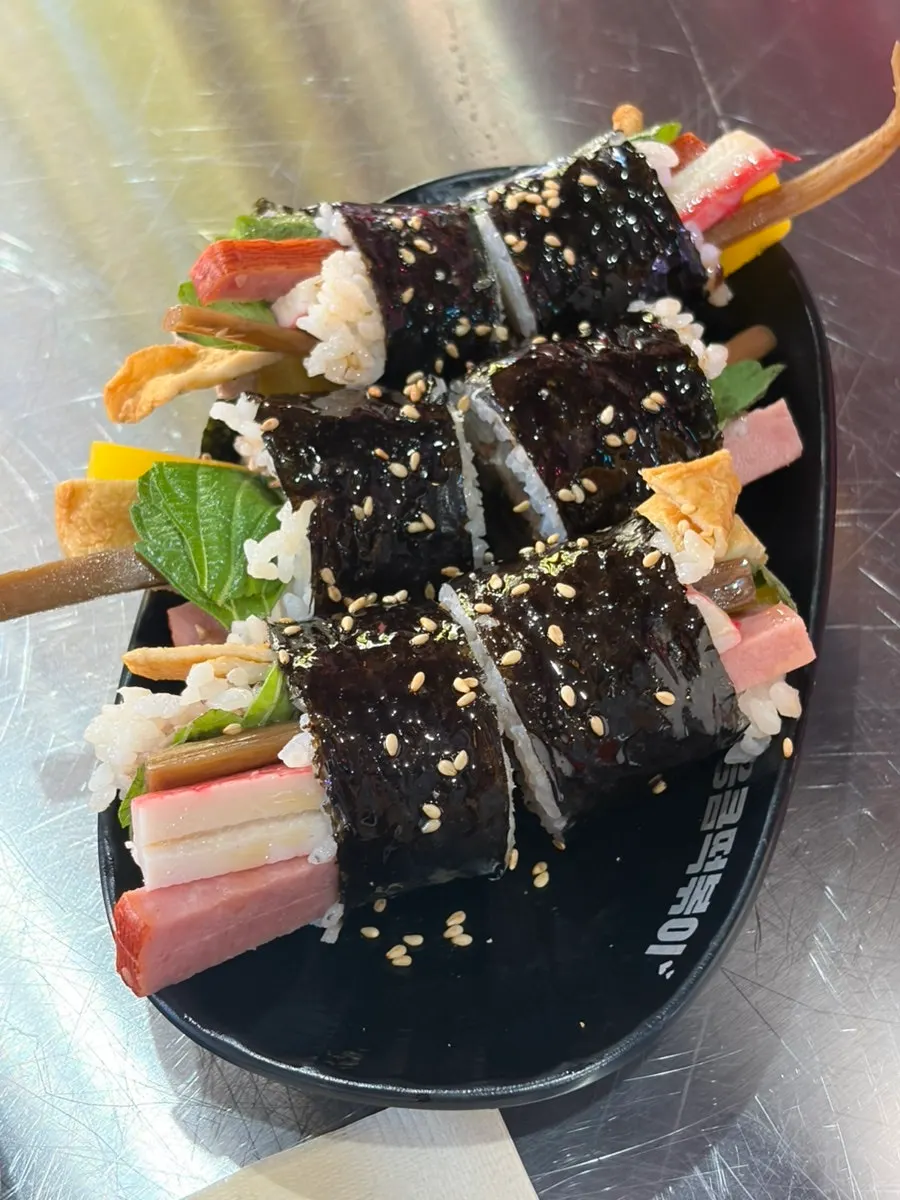 Cross-section of a roll of cheongryang mayo tuna gimbap