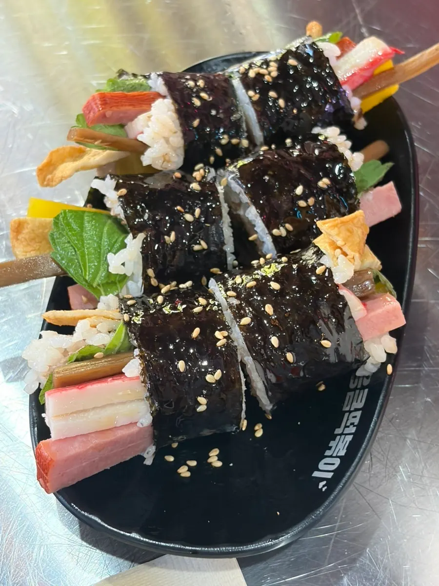 Tuna gimbap paired with spicy tteokbokki