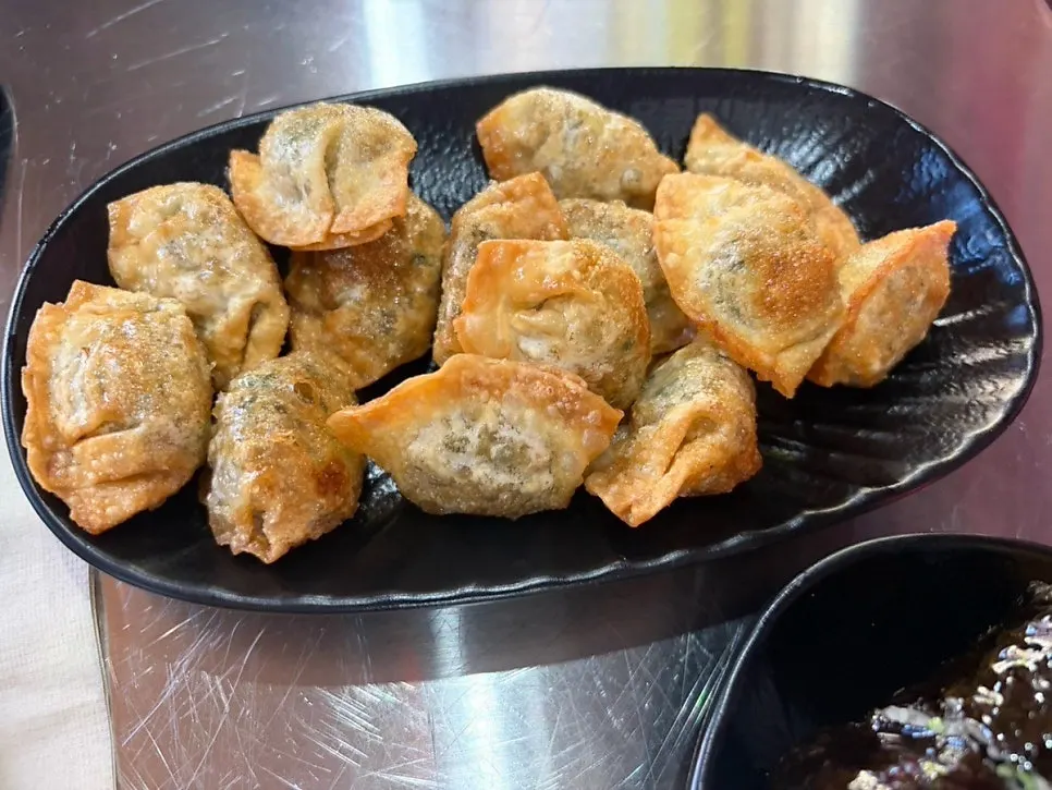 Plate of free fried mandu given as service