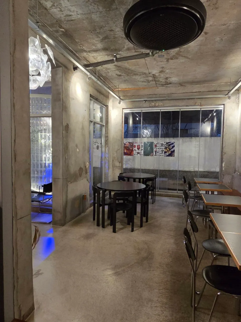 Interior with concrete walls and vintage lighting