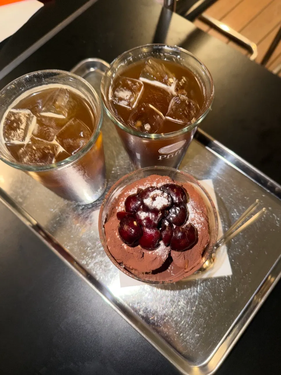 Cherry tiramisu and a decaf iced Americano