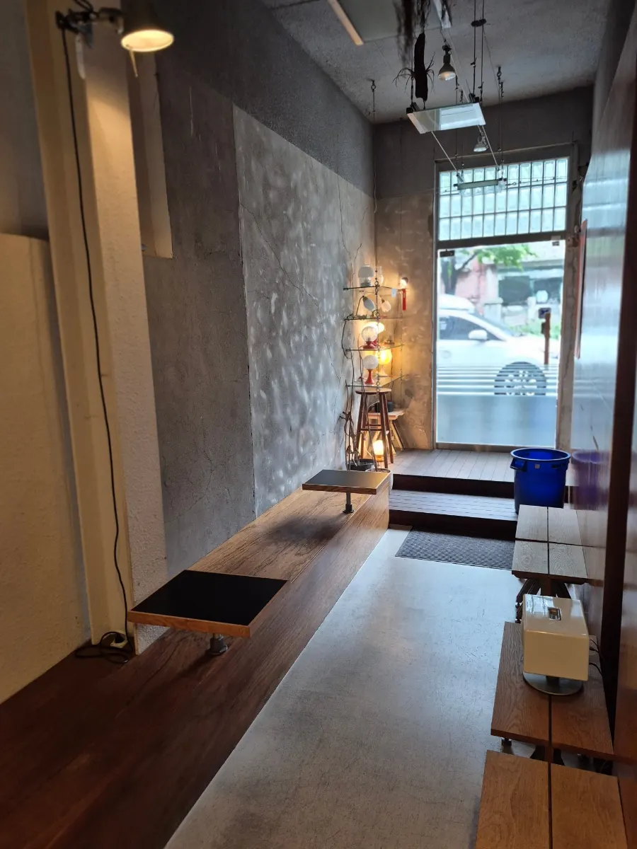 Pip Espresso Bar's interior decorated with exposed concrete and wood