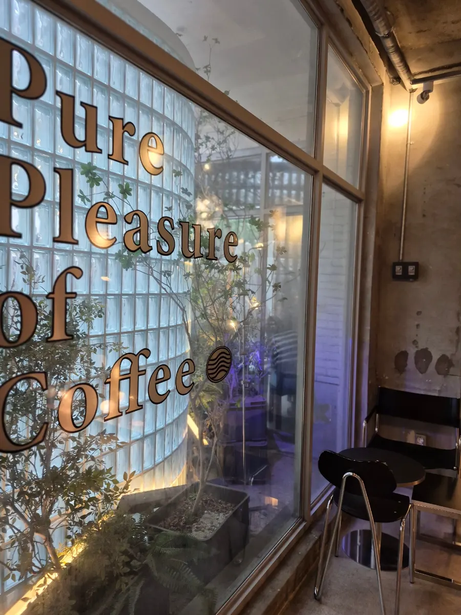 A corner of the café displaying lighting like a showroom