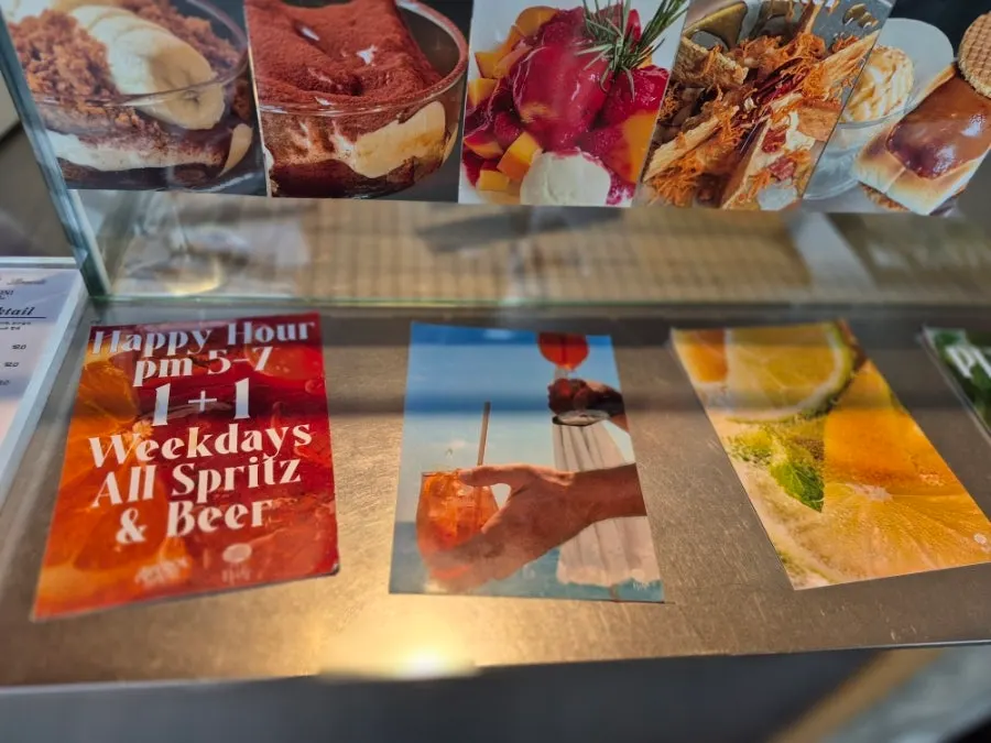 A section of the menu board listing espresso drinks