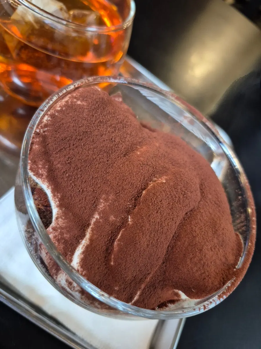 Pip Espresso Bar's tiramisu being scooped with a spoon
