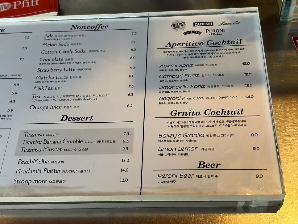 Menu board listing espresso options