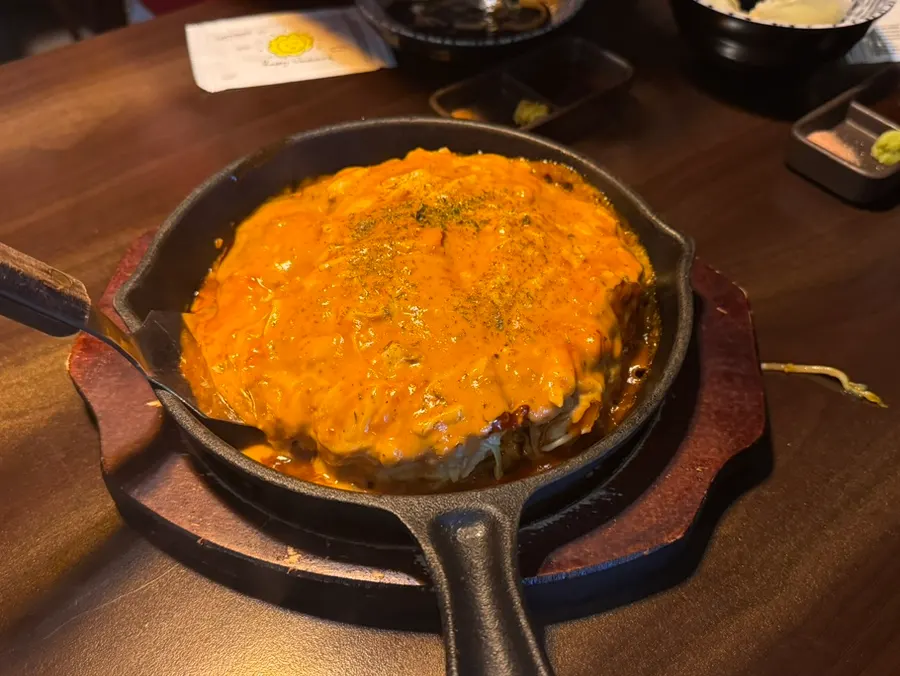 A plate of chipotle okonomiyaki
