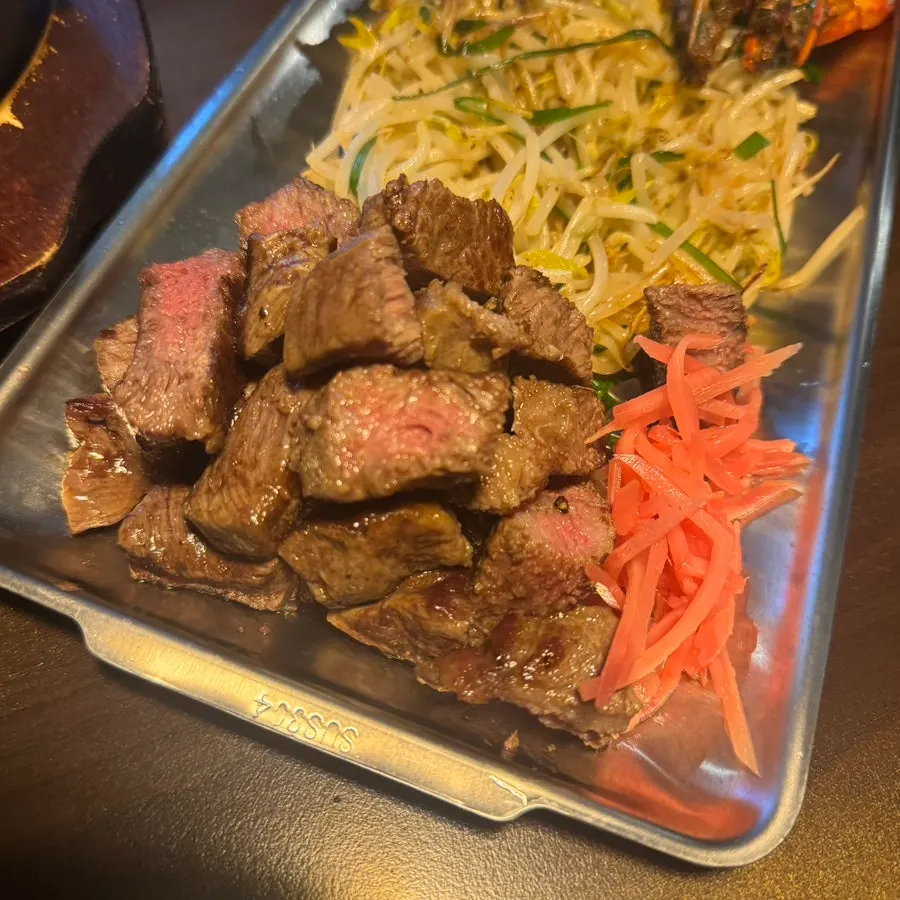 Flat iron wagyu and stir-fried mung bean sprouts