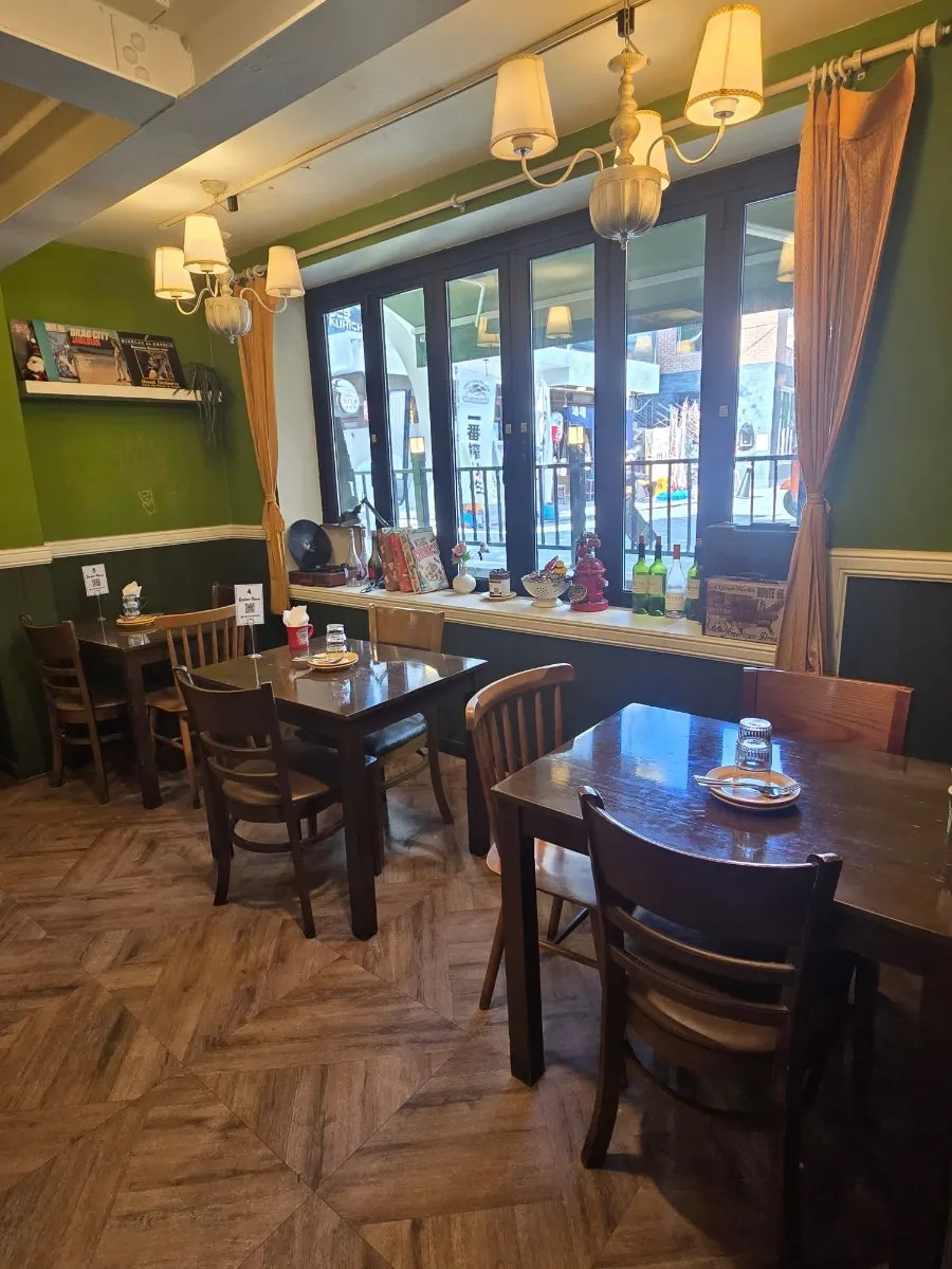 Hey Joji dining room with well-spaced tables