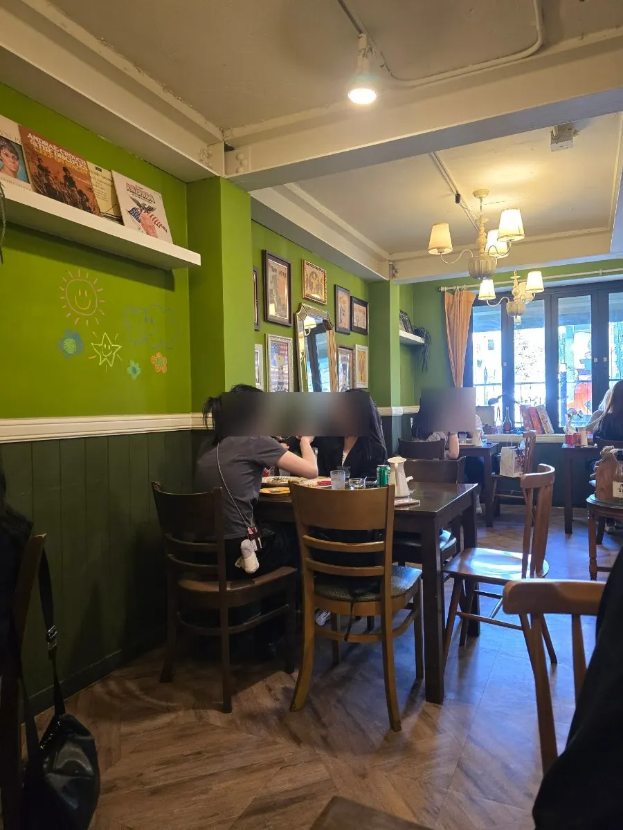 Cozy lit seating at Hey Joji