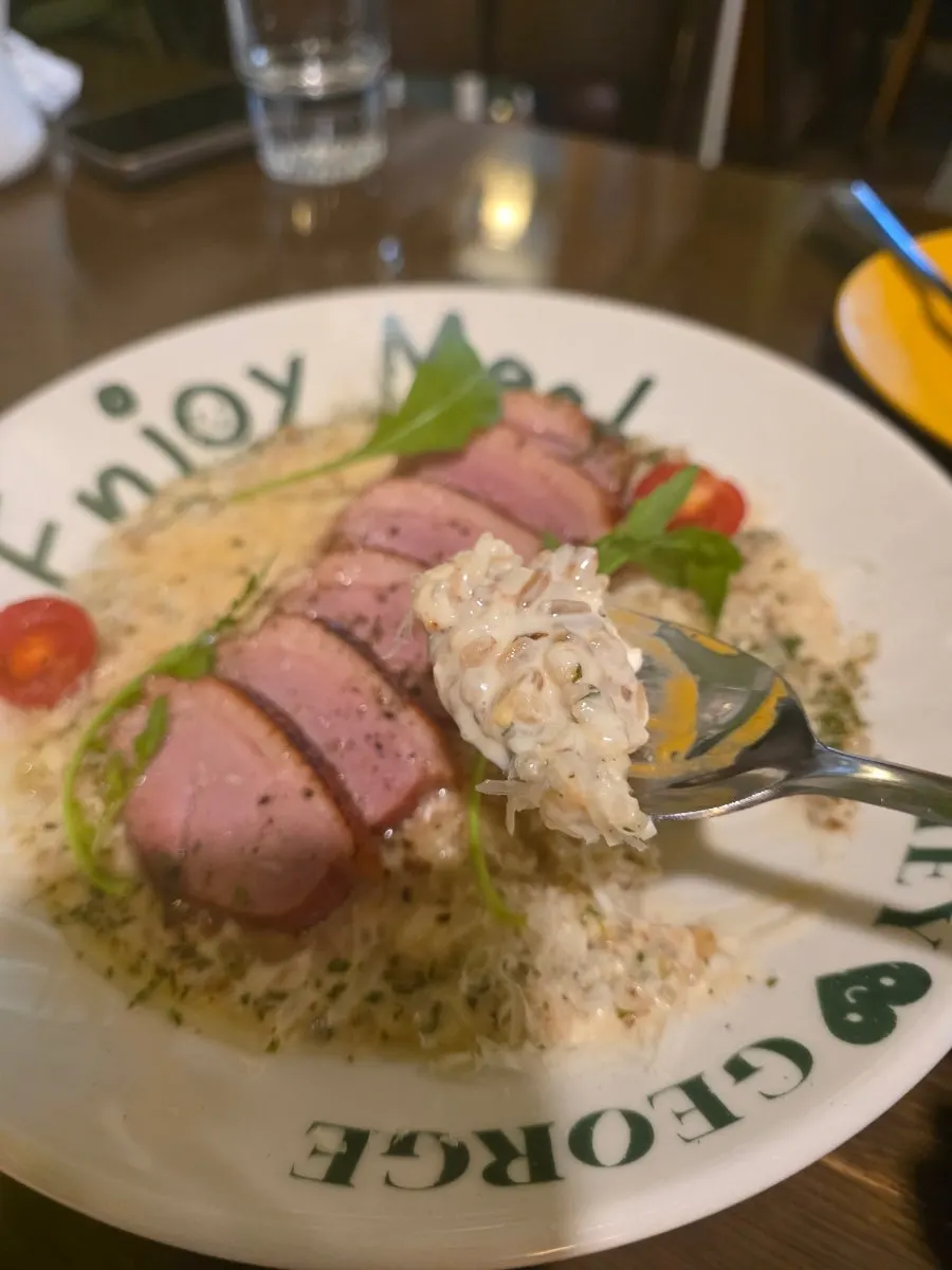 Close-up of duck steak cream risotto