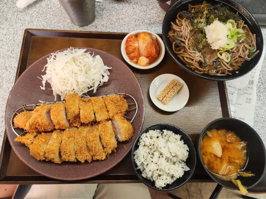A piece of fillet katsu dipped in salt