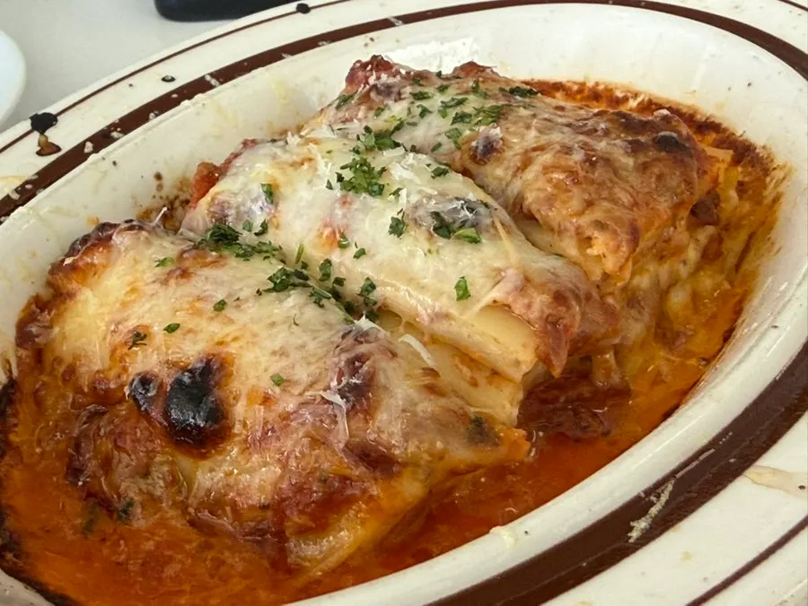 Classic lasagna cut into easy-to-eat pieces