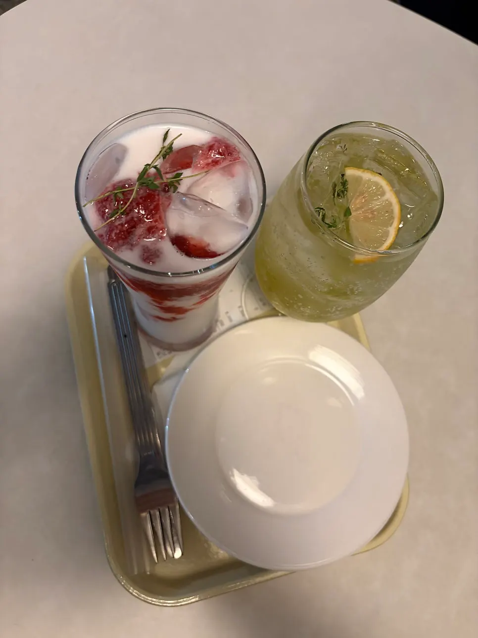 Table setting with green grape ade, strawberry milk, and original pancakes at Jam Jam
