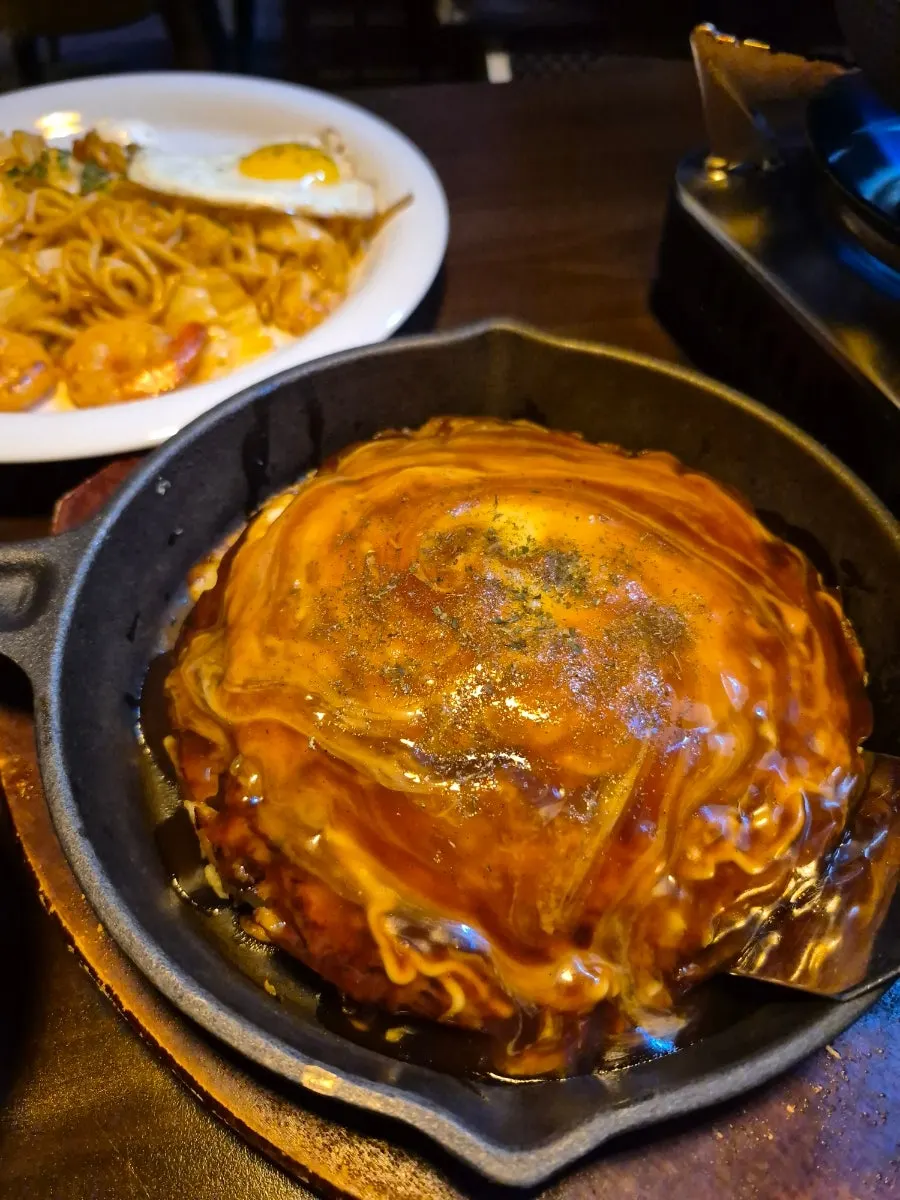 A plate of Gusa okonomiyaki
