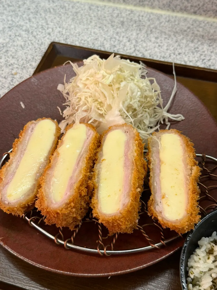 Cheese pulling from the cheese katsu at Katsu Monster Yeonnam Main Branch