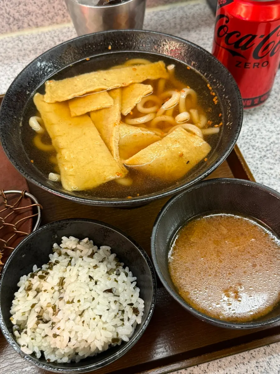 A bowl of spicy udon with a sharp broth
