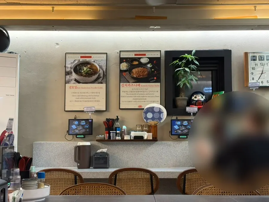 Interior with 2-person and 4-person tables at Katsu Monster Yeonnam Main Branch