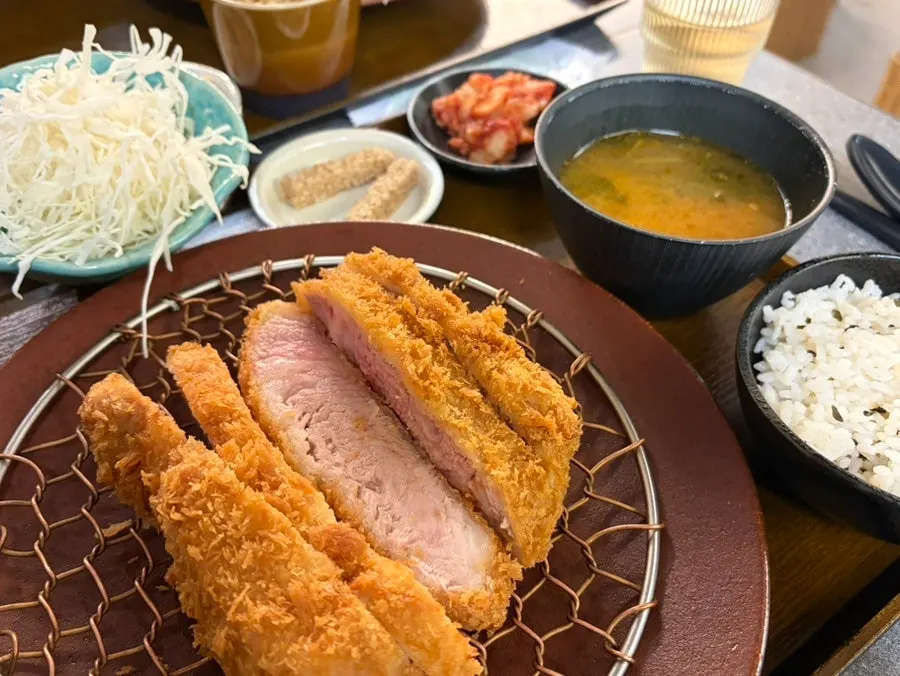 Table set with loin katsu, fillet katsu, and spicy curry