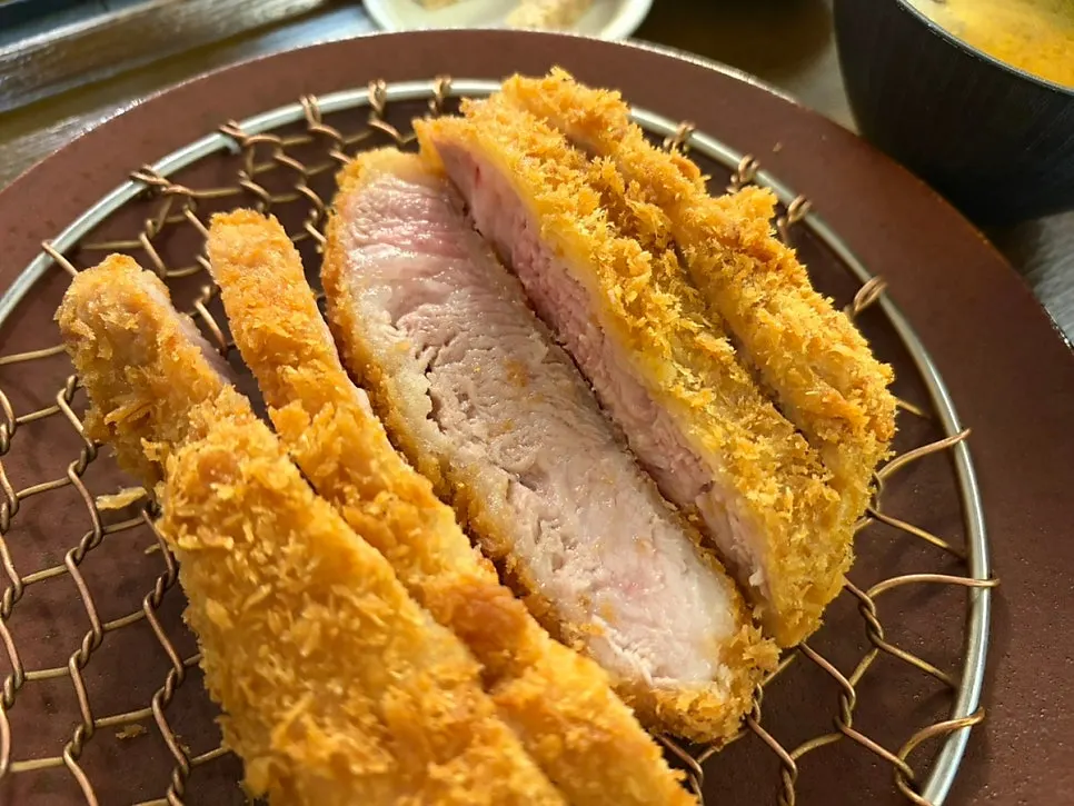 Cross-section of the loin katsu showing its double fat layer