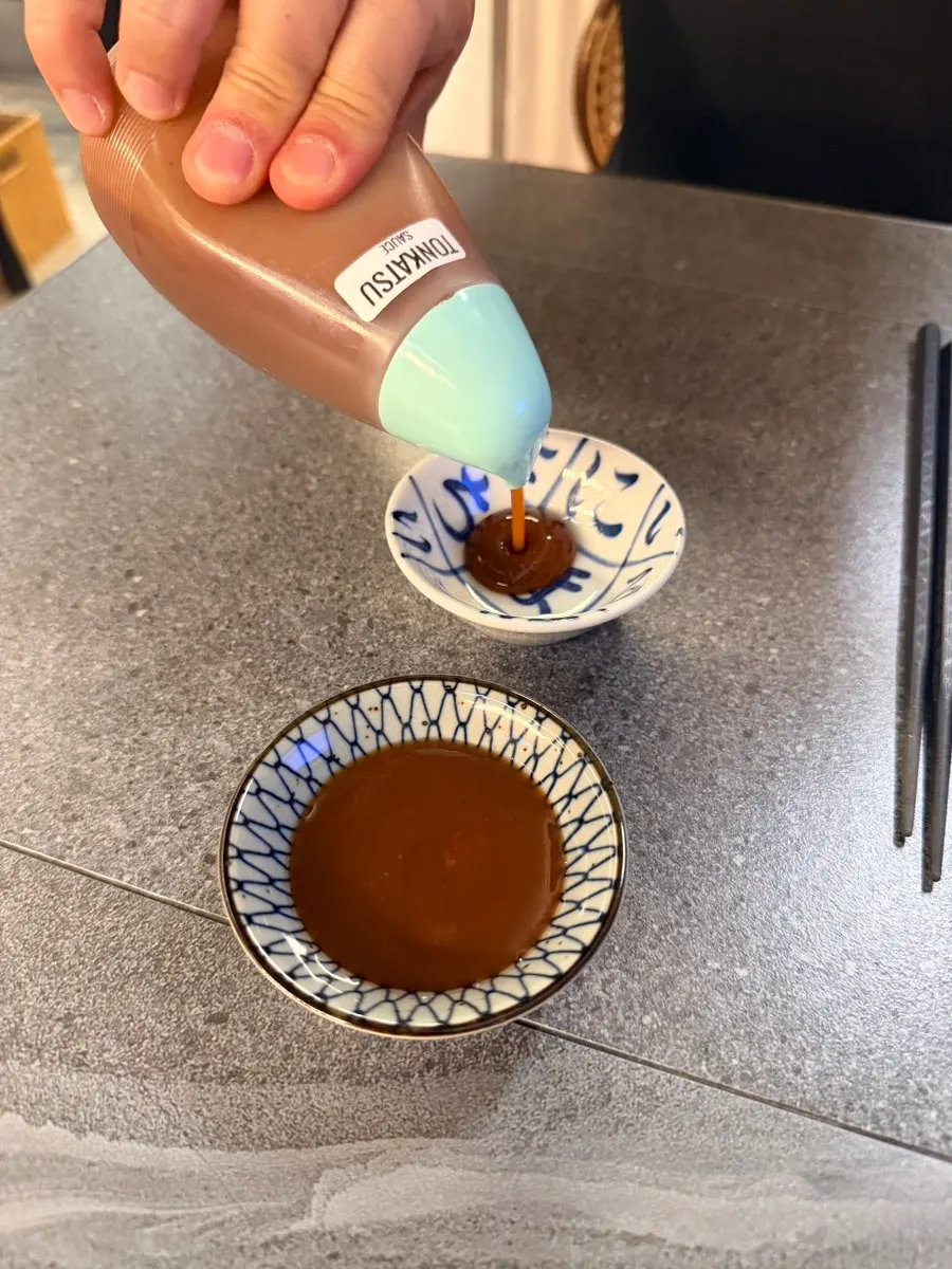 Donkatsu sauce, wasabi, and salt set on the table