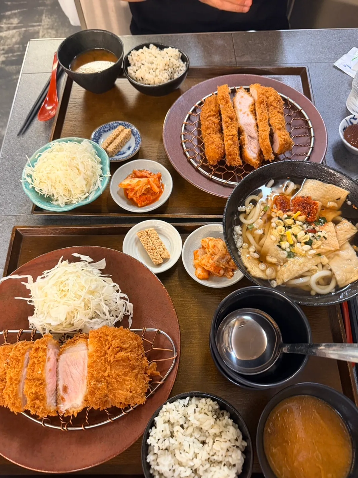 Full donkatsu spread with salad, kimchi, clear soup, and rice