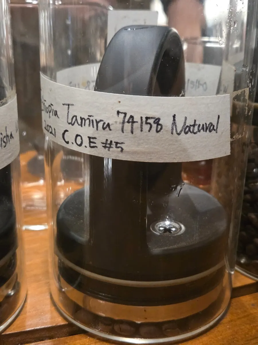 Café bean display in glass jars