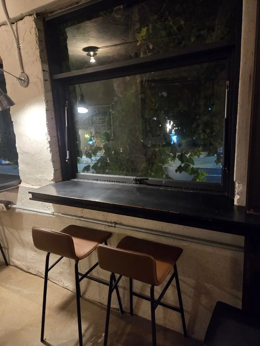 Coffee and dessert tray at a window seat