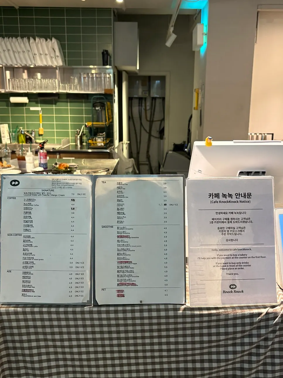 Noknok's drink menu board listing coffee and smoothies