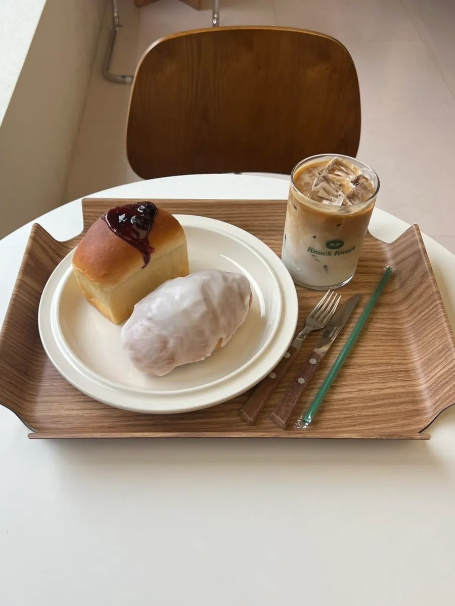 Two bakery items with coffee