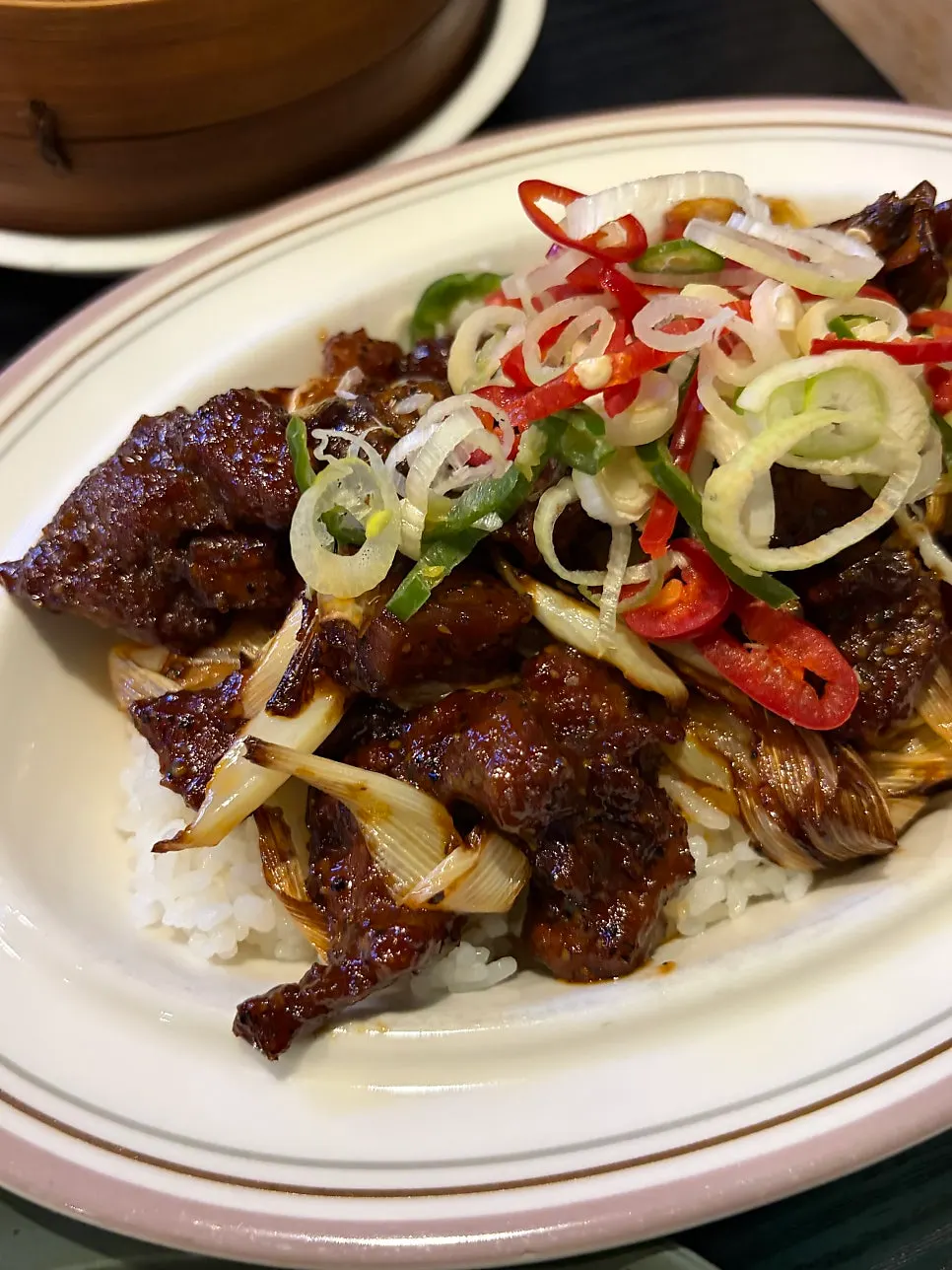 Black pepper beef rice bowl at Panda Dim Sum
