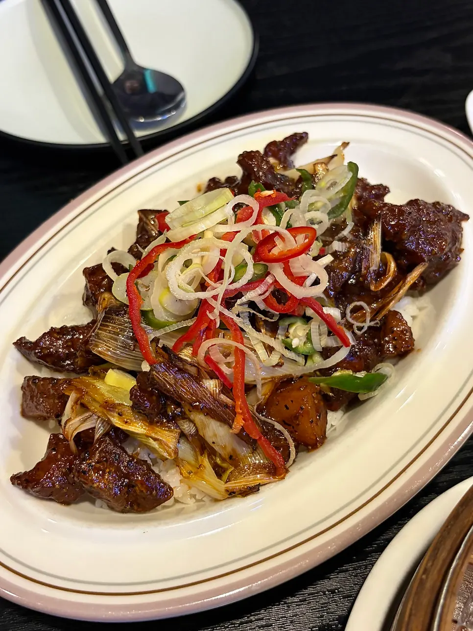 Black pepper beef rice bowl at Panda Dim Sum