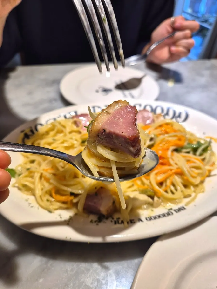 Close-up of julienned carrots mixed in like noodles