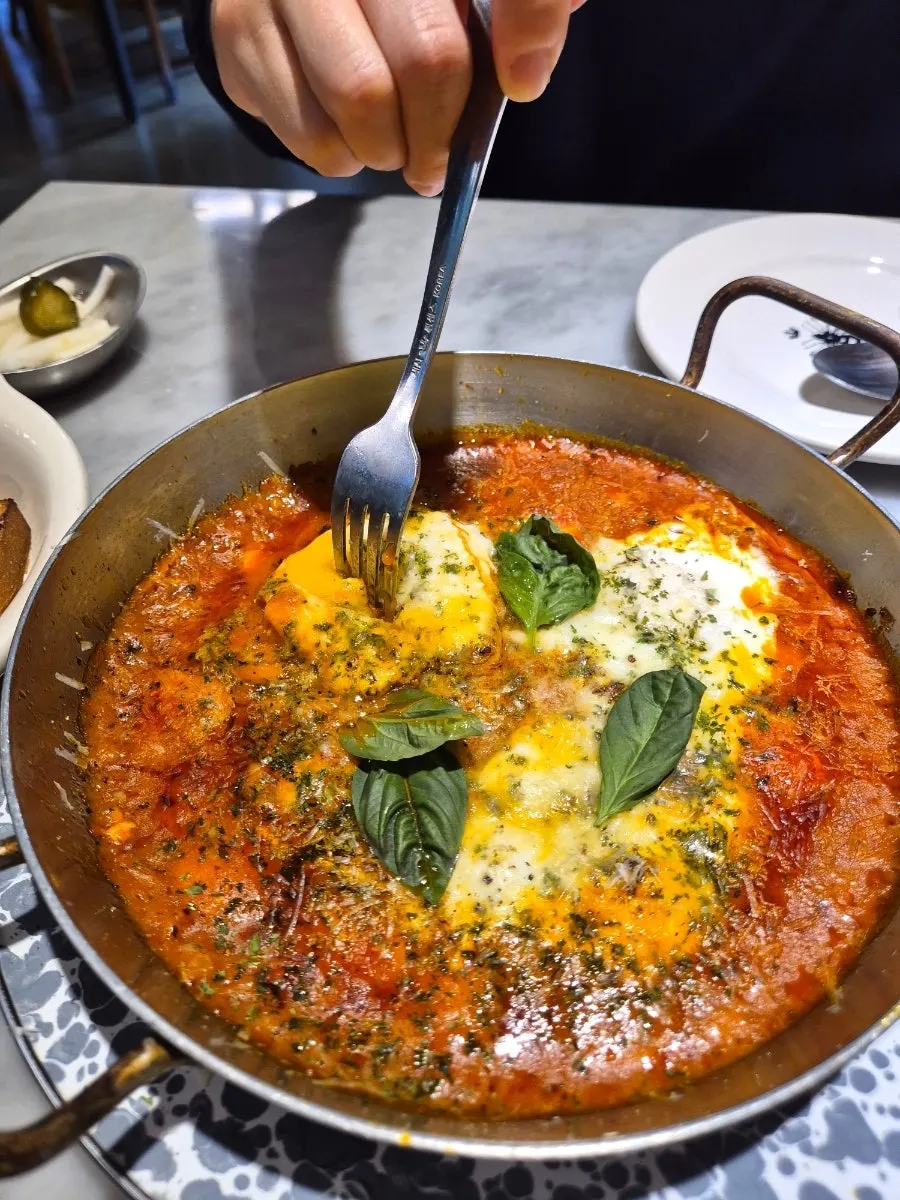 Bread dipped into the egg in hell sauce