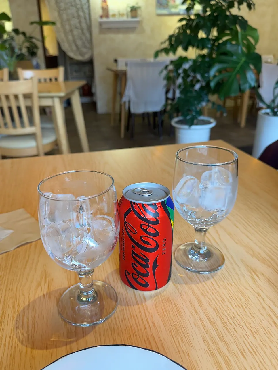 Glasses of ice and Coke Zero order